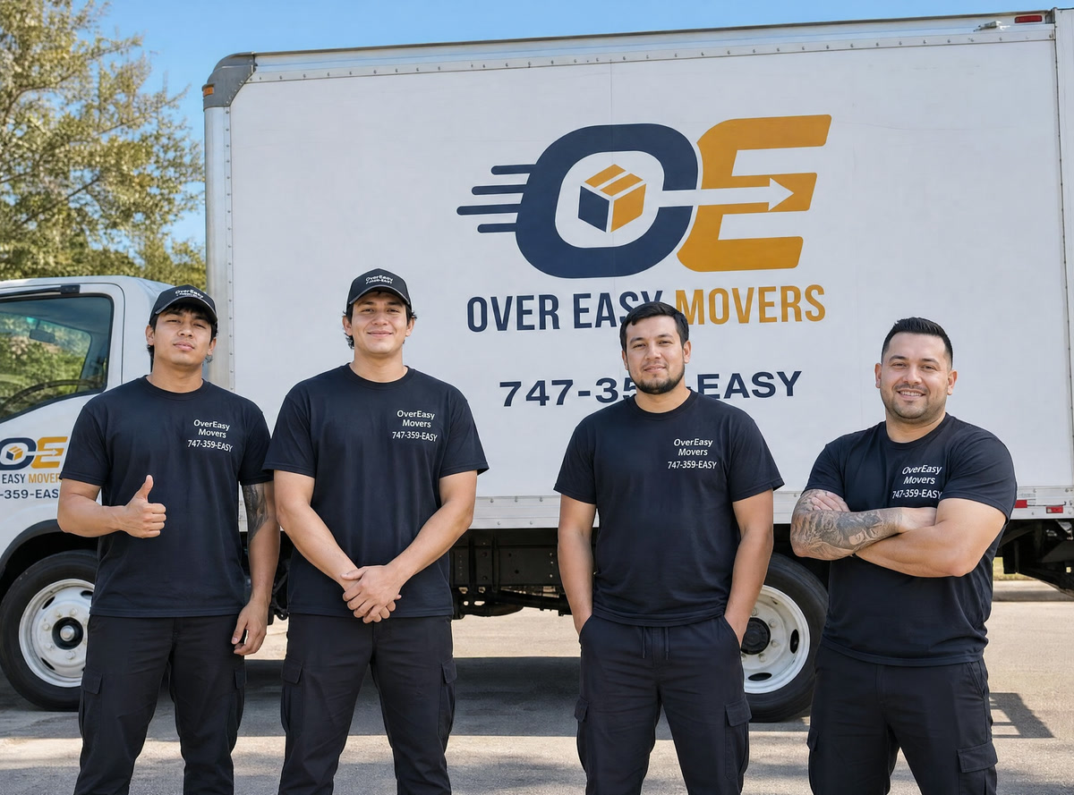 The four-person OverEasy Movers crew in front of their branded truck